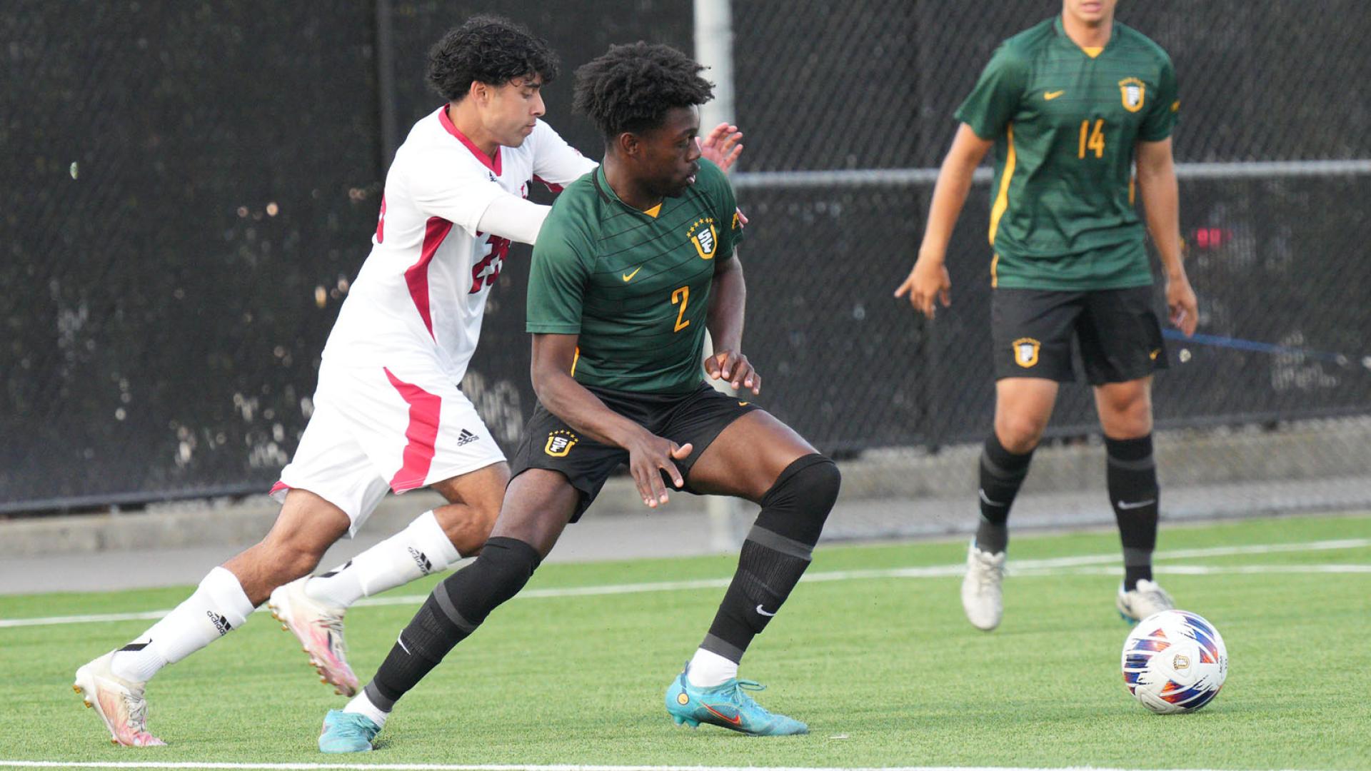 USF men&#039;s soccer player blocks opponent 