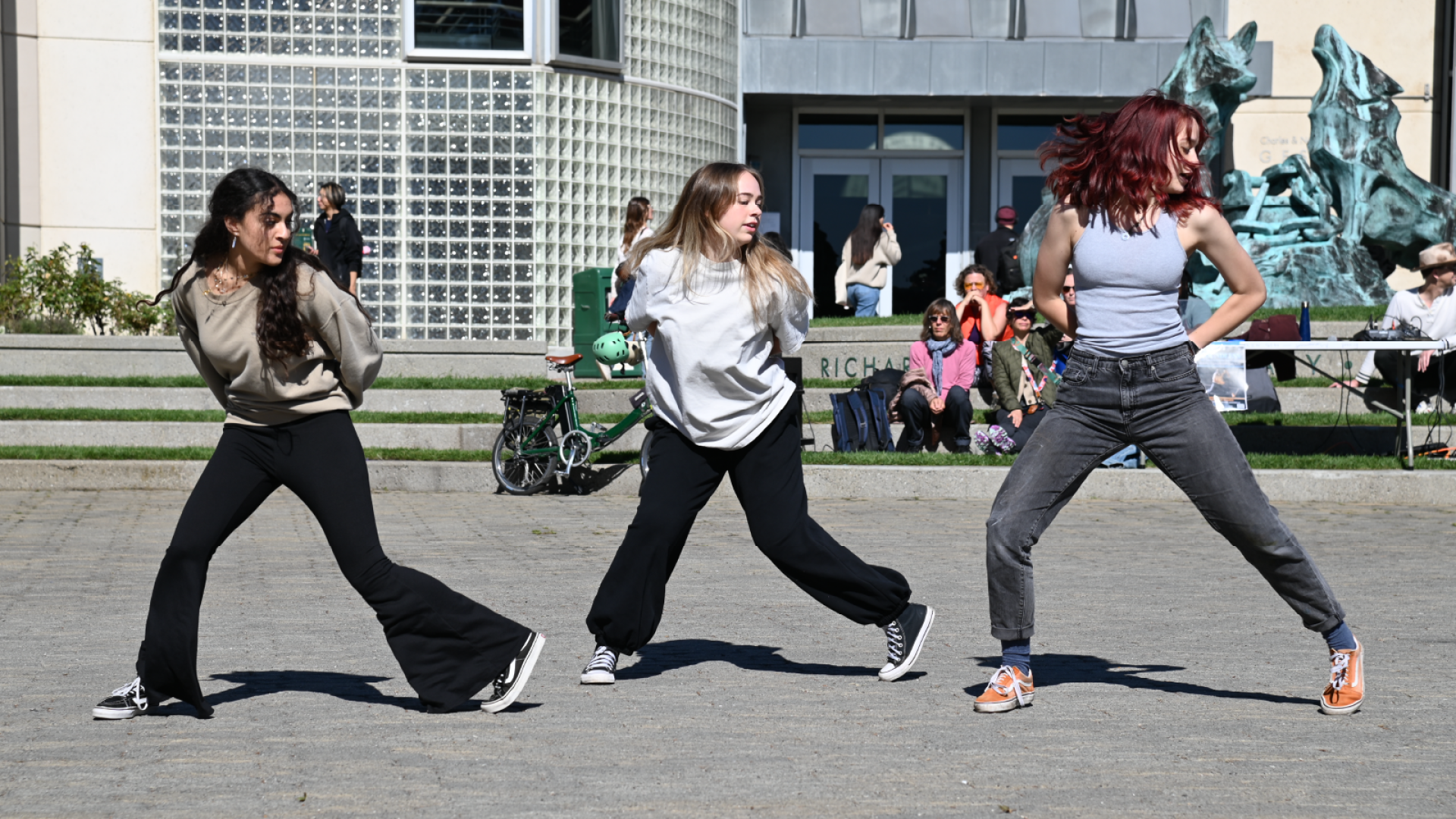 Dance students performing on Gleeson Plaza