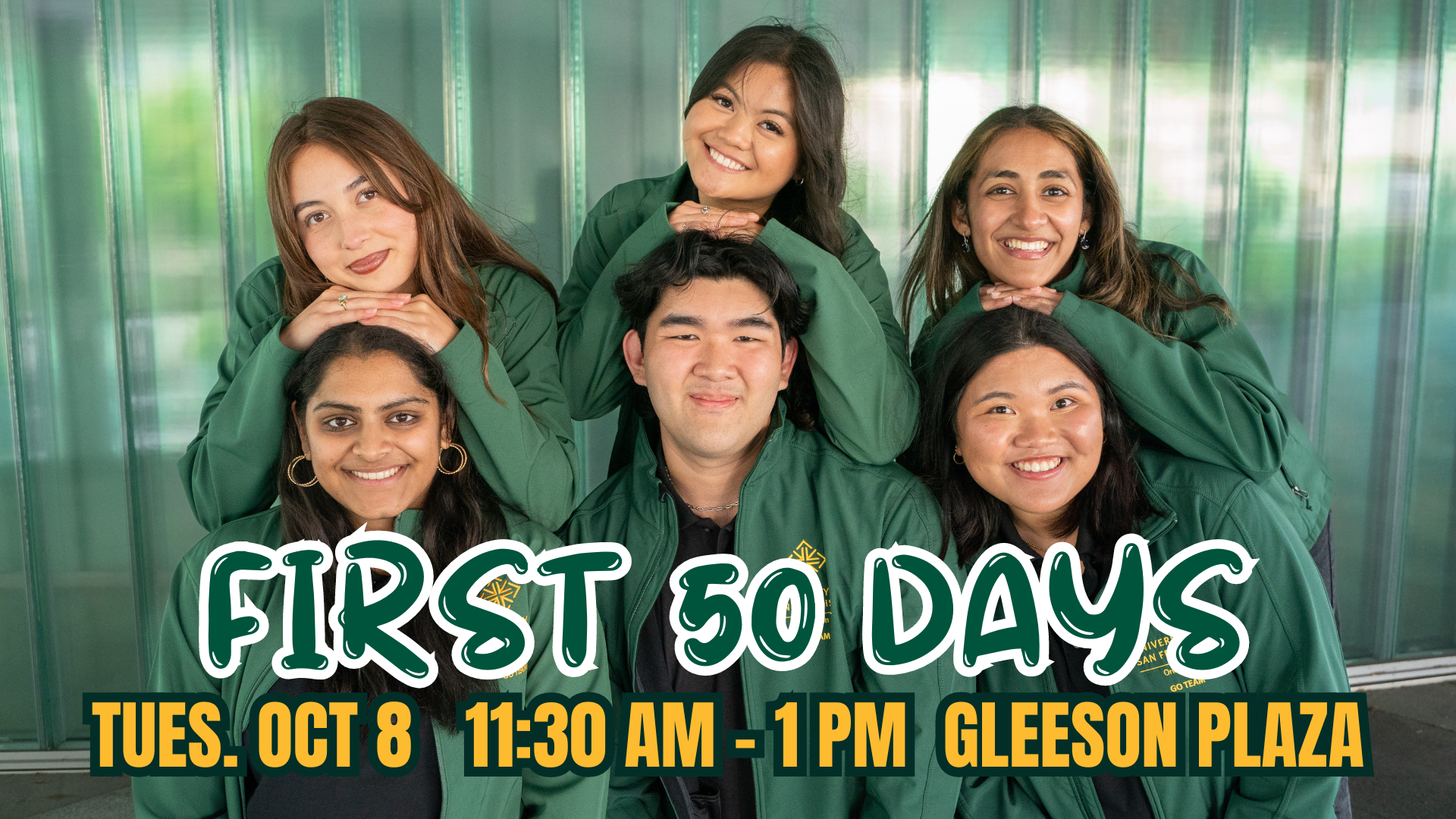 Six students smiling with Green Jackets on.