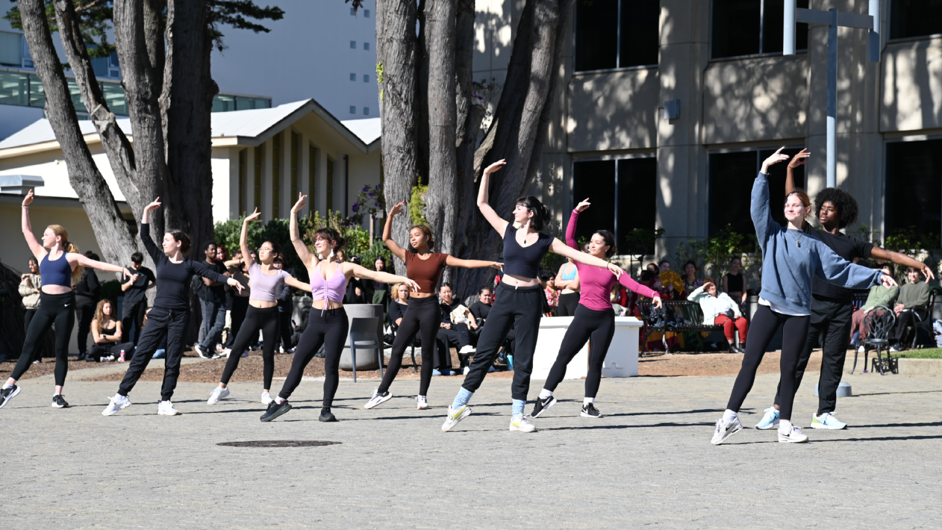 Student dancers doing ballet in Gleeson Plaza