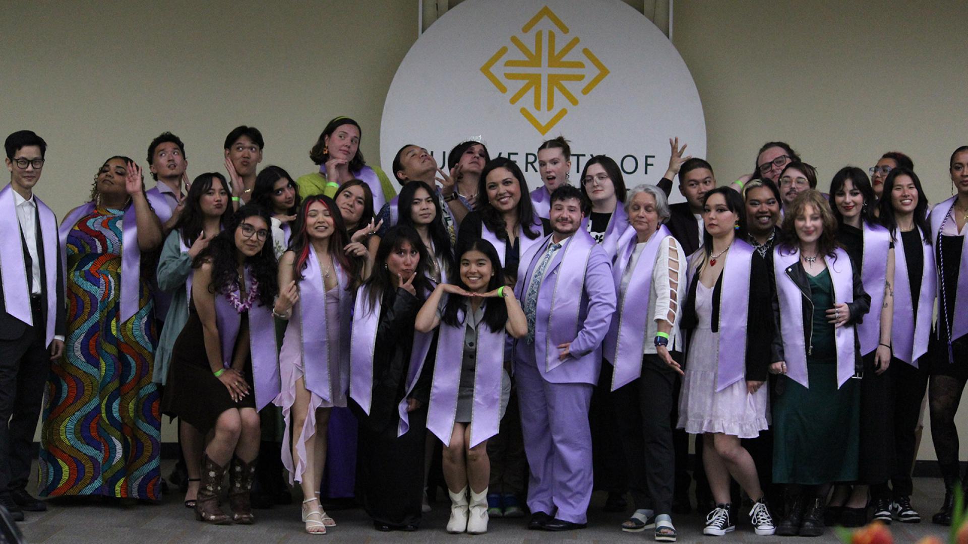 students at lavender commencement
