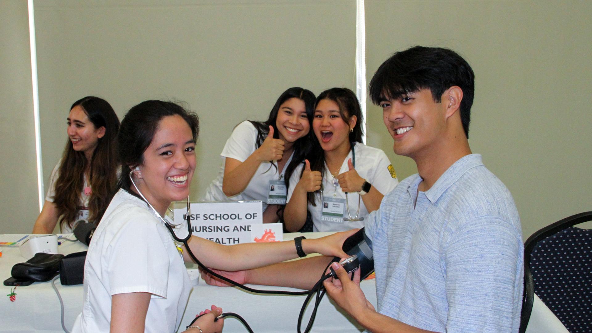 Students checking on each other's health