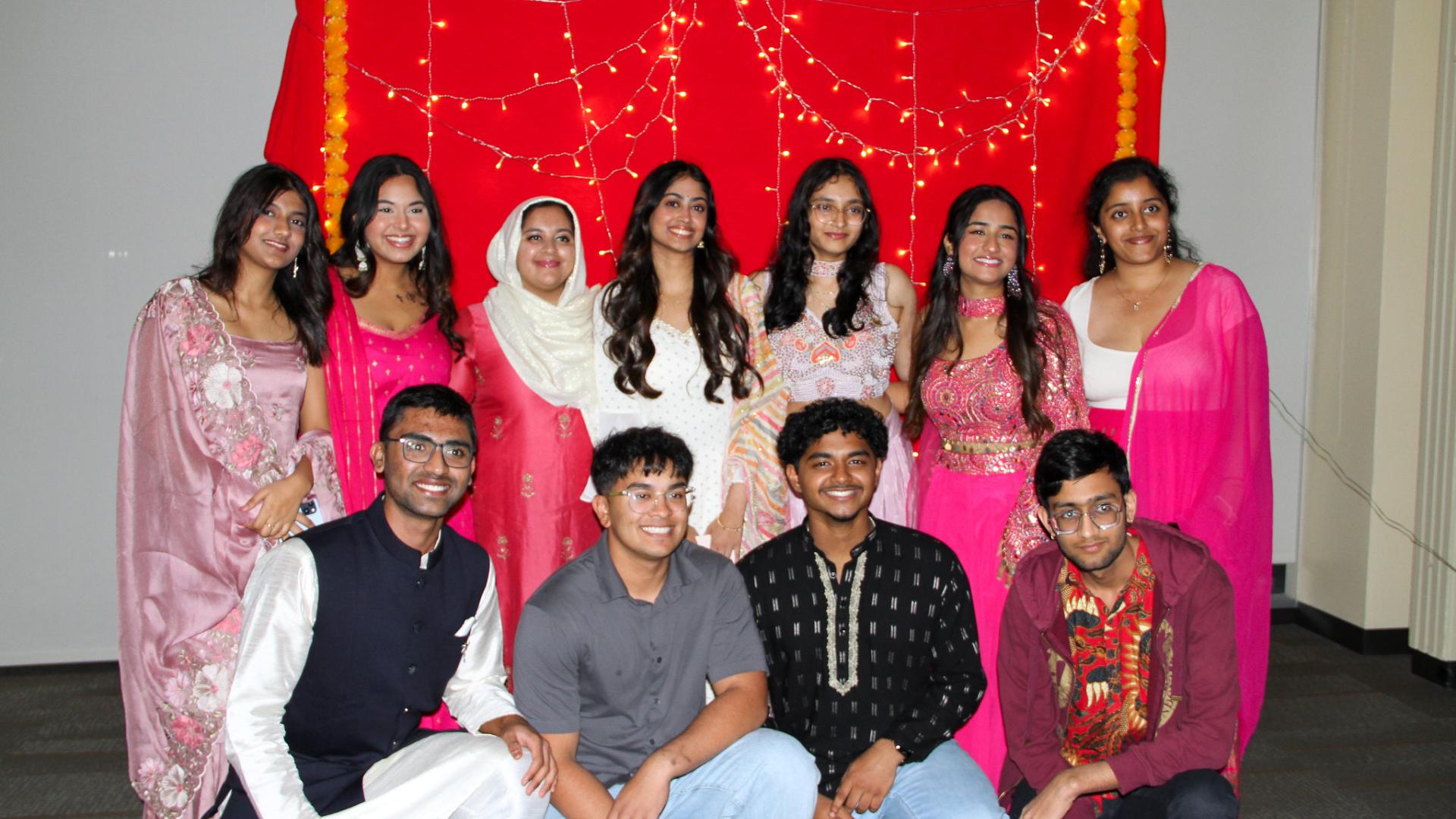 students in traditional clothings