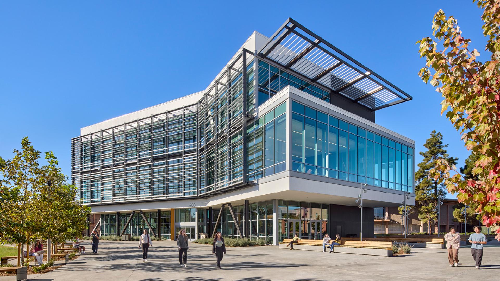 Building with students and trees