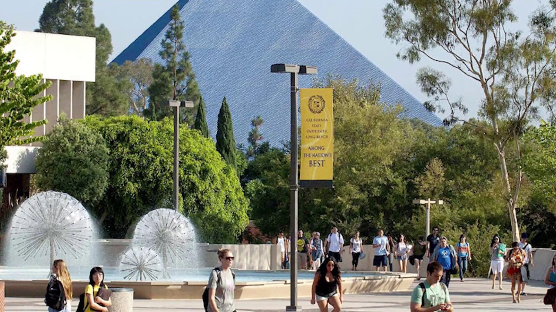 Long Beach Campus with students and Pyramid shaped arena in the background