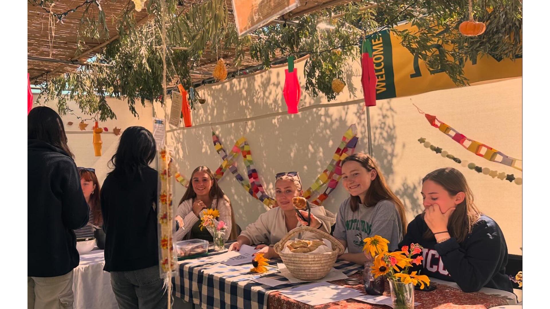 Students serving food made from USF&#039;s community garden