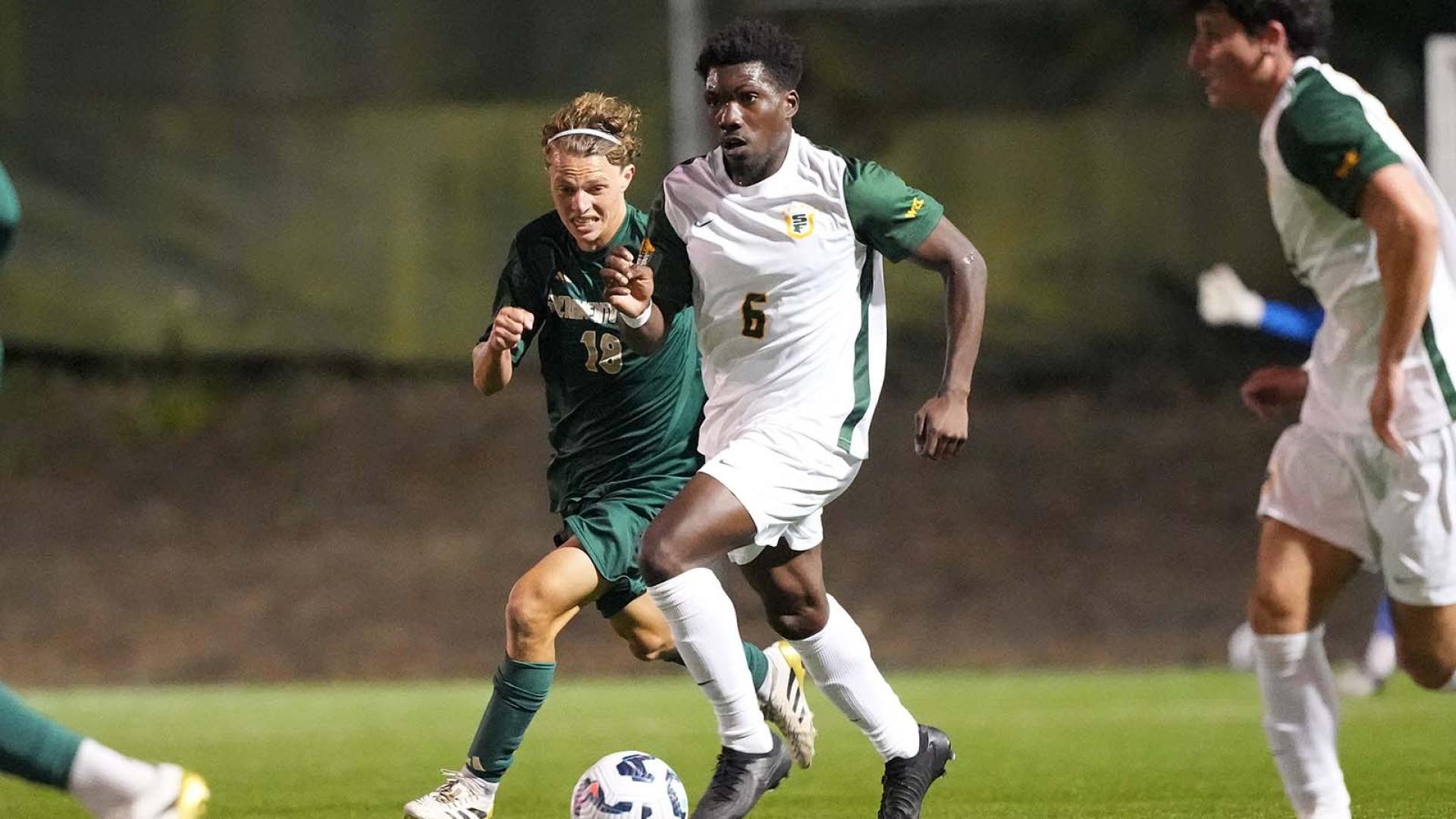 Soccer player dribbling