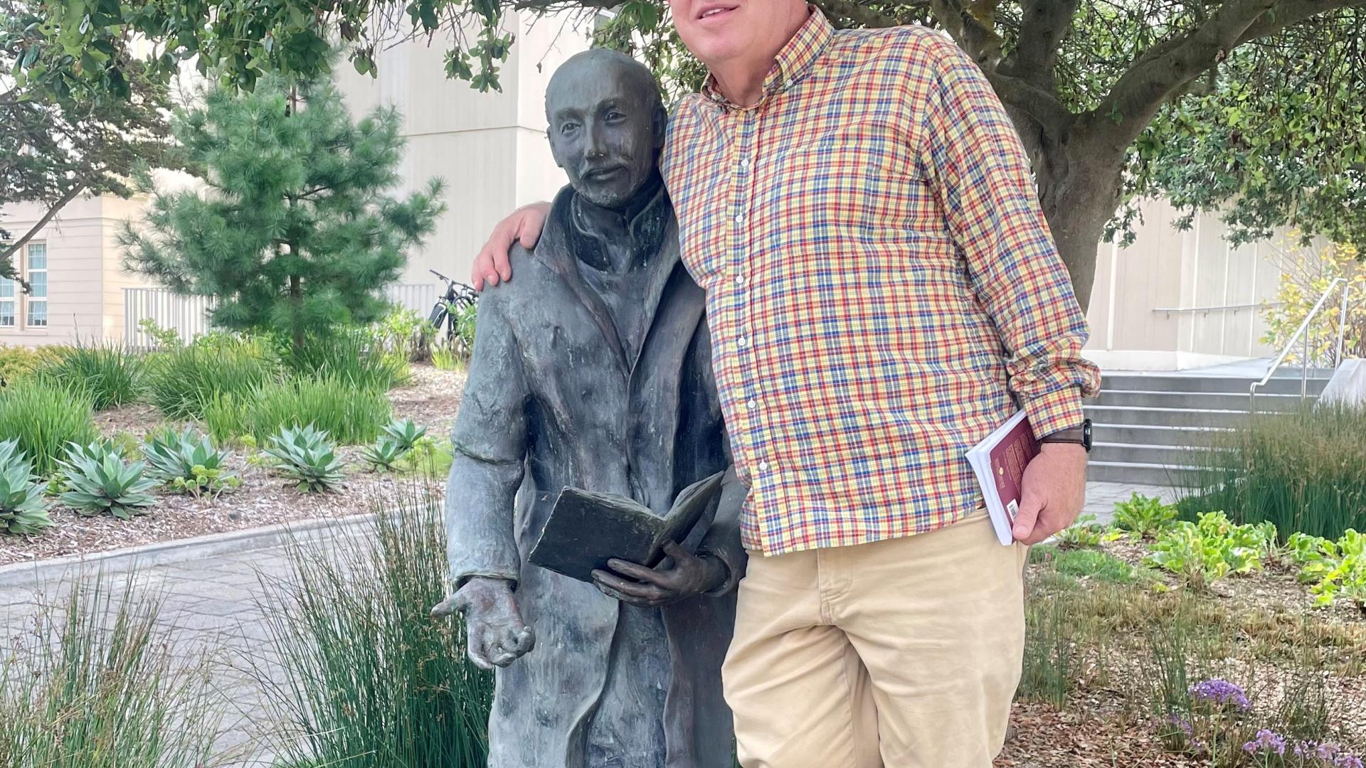 person and statue
