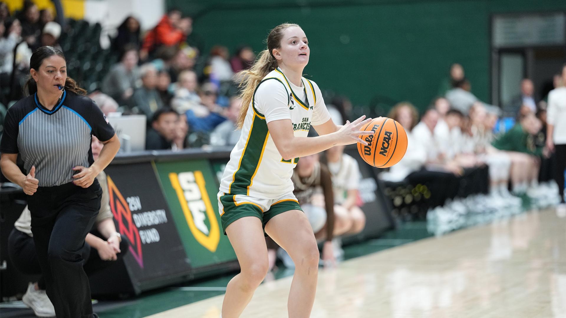 Women's basketball player on the court