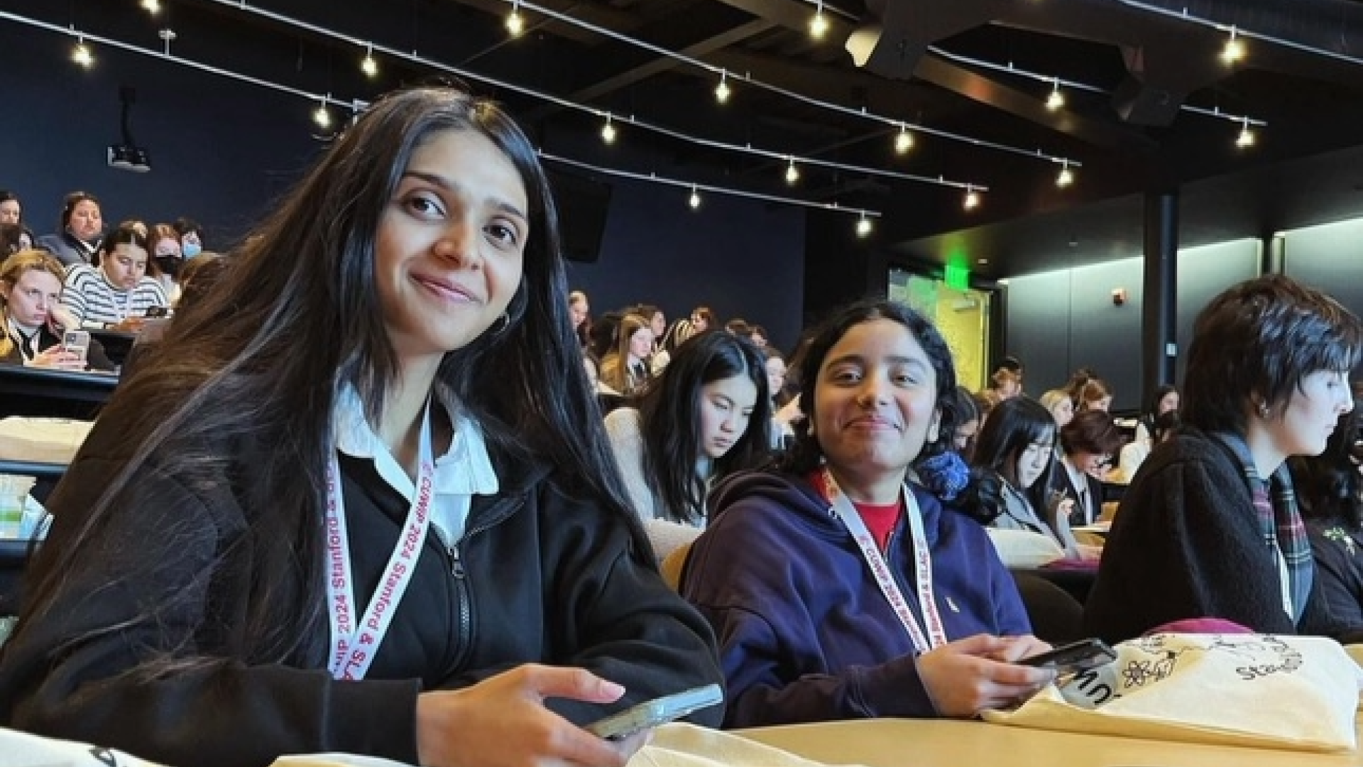Students in lecture hall attending a workshop