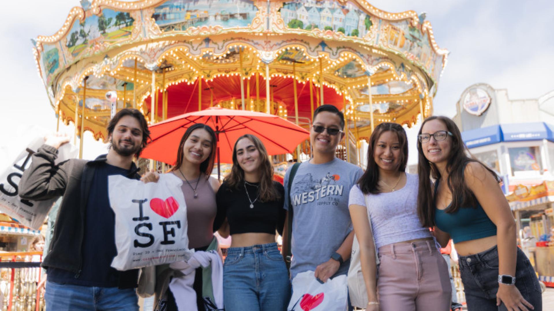 Six students at a fair.