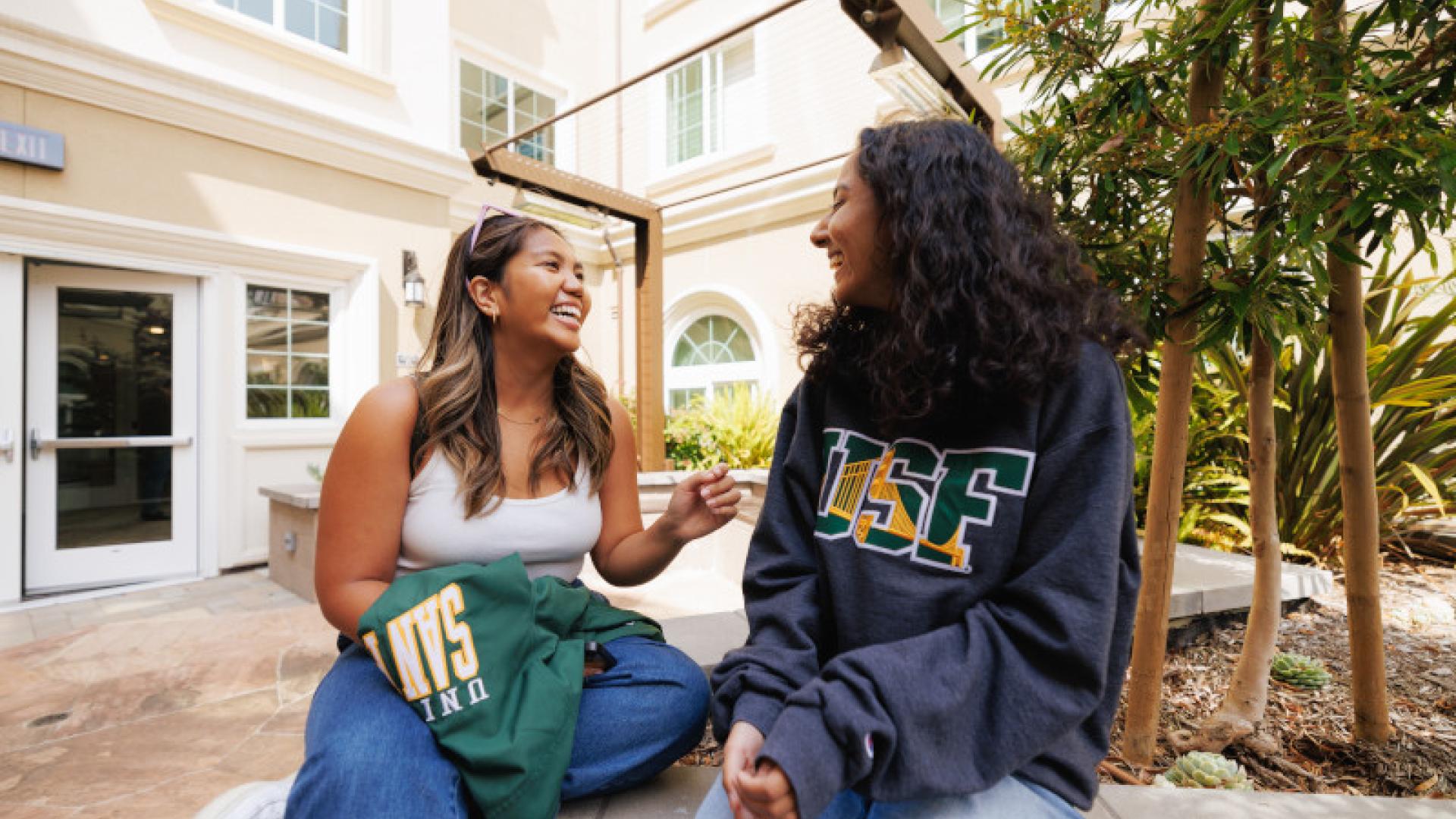 Two students having a conversation.