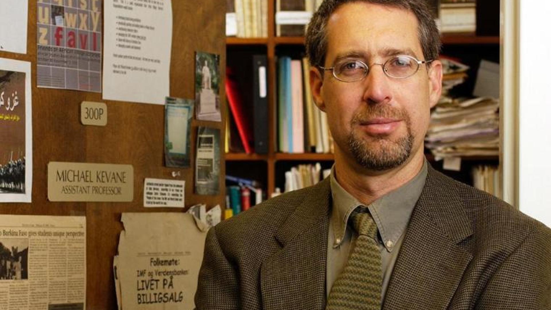 headshot of Prof Kevane