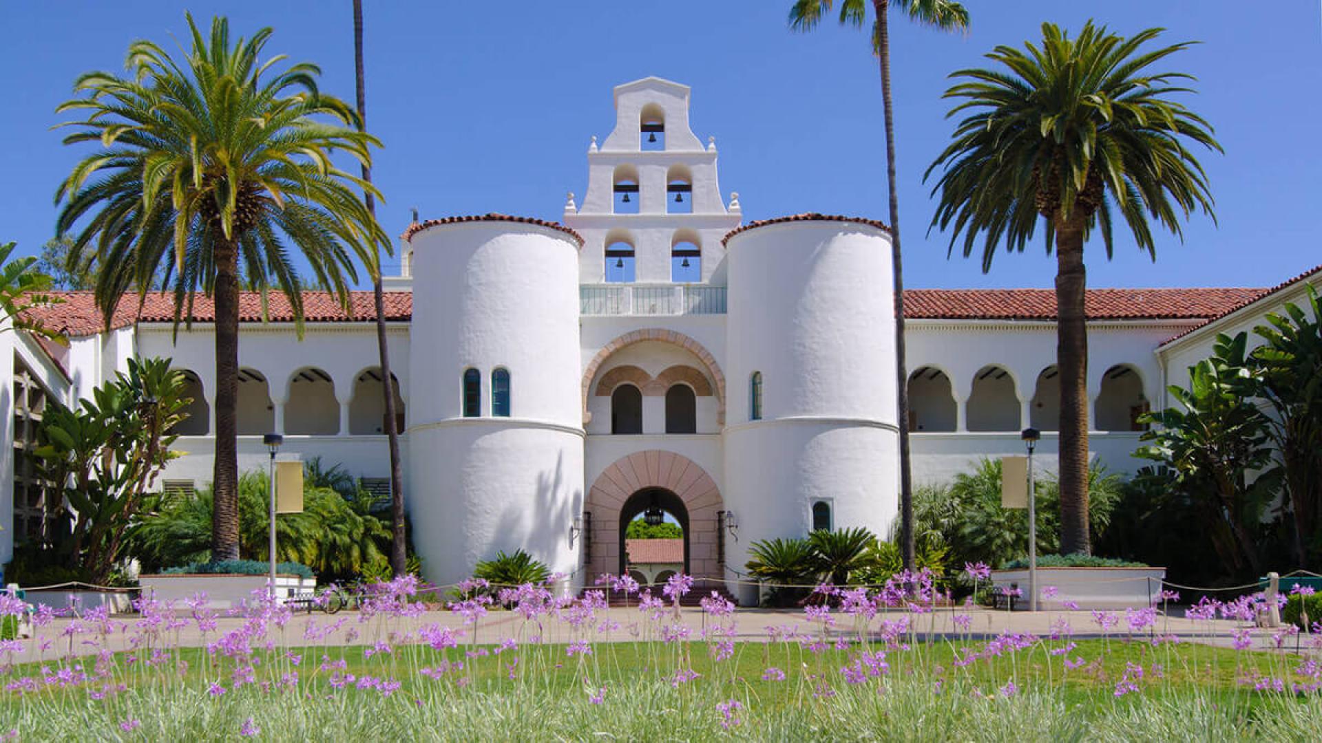 White building with palm trees