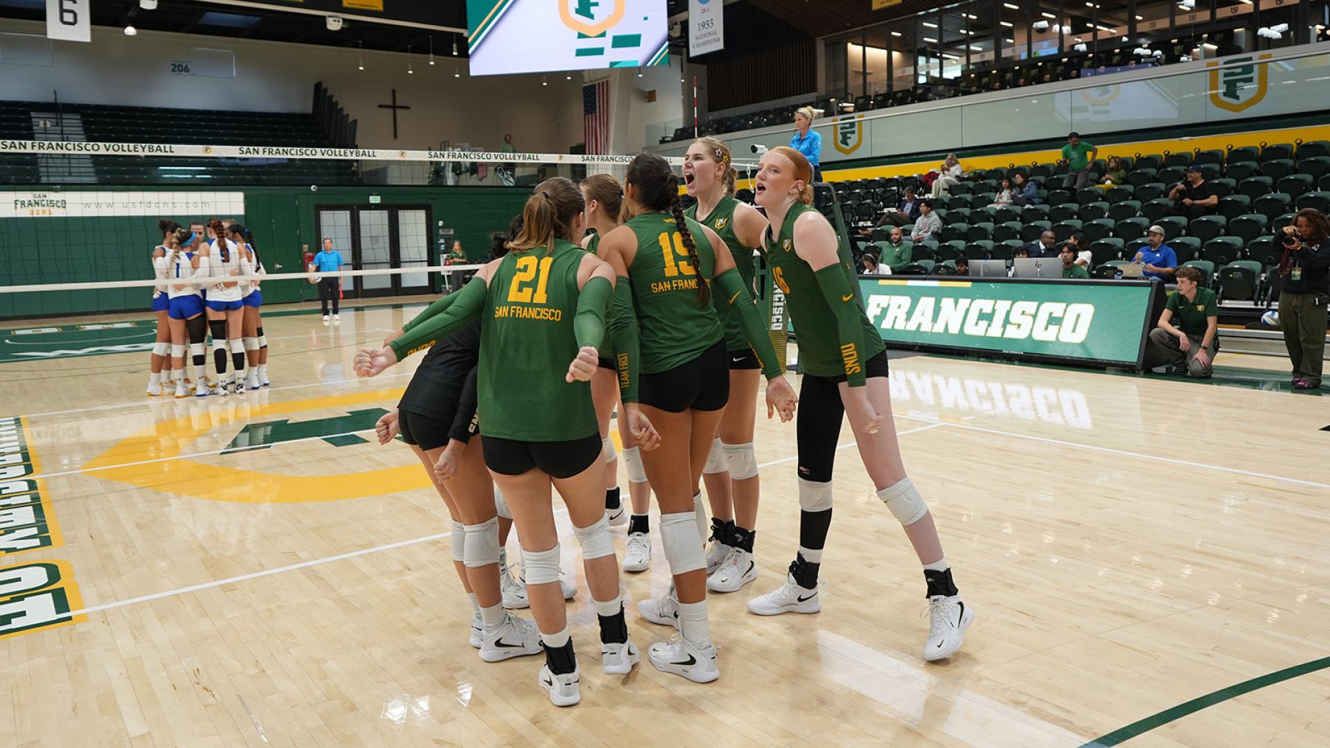volleyball players get pumped up before game