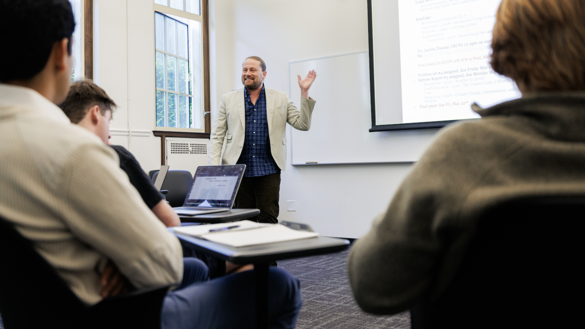 professor Hughes presenting to students